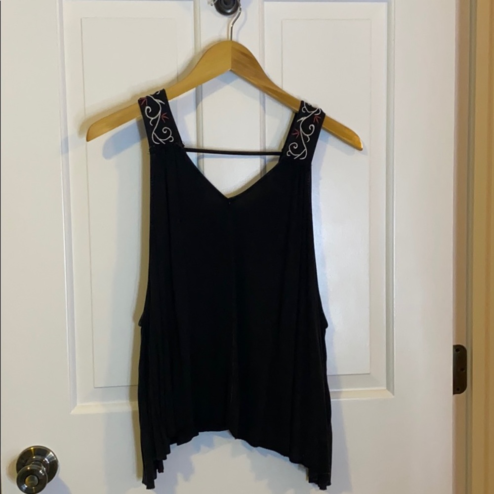 Black top with embroidery detail